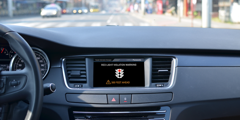 A concept image of car displaying a notification on the dash for an upcoming red light
