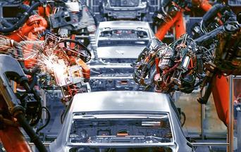 cars on an automated assembly line