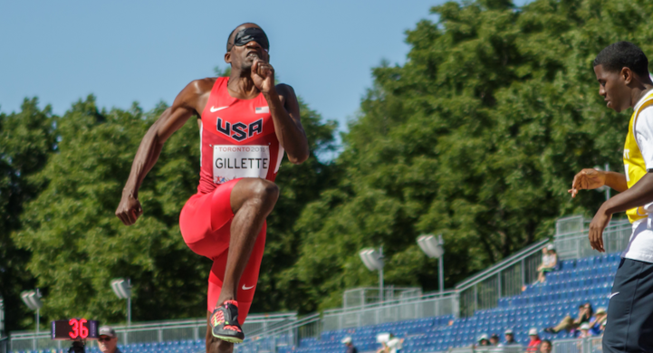 Lex Gillette prepares to transition from the run-up to the take-off of his long jump